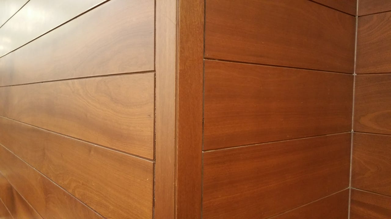 Close-up of modern wooden wall panels showcasing clean lines and texture.